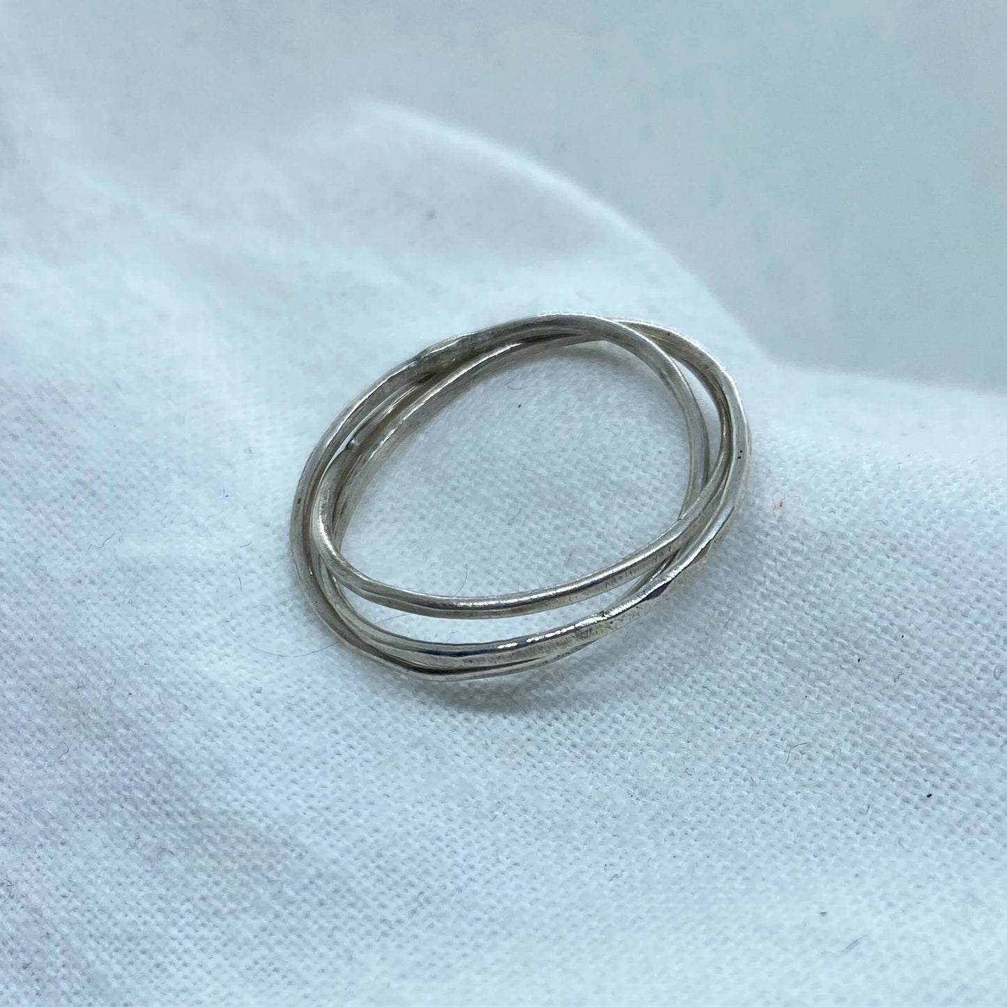 anxiety ring spinning  handmade from three interlinked rings 