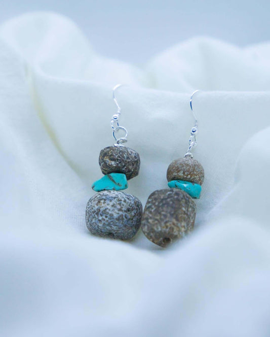 Personalised  Earring are made from 30,000 year mammoth beads found on the Jurassic coast in the south of England